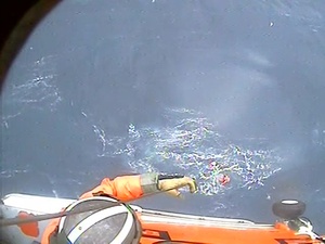 Coast Guard hoists sailor in distress in heavy-weather rescue