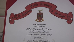B-Roll of female Marines holding certificates from combat related military occupational specialty schools