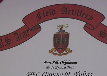 B-Roll of female Marines holding certificates from combat related military occupational specialty schools