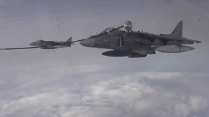 340th Expeditionary Air Refueling Squadron, refuel two AV-8B Harrier II's