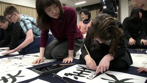 B-roll of MCAS Iwakuni Students Learning to Paint Japanese Calligraphy