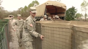 La. Guardsmen build levees during ‘Operation Winter River Flooding’