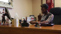Faces of MLG: Marine Makes a Difference Opening Center for Abused Women
