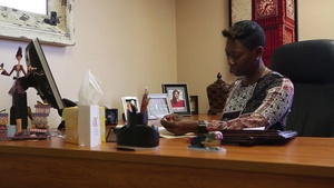 Faces of MLG: Marine Makes a Difference Opening Center for Abused Women