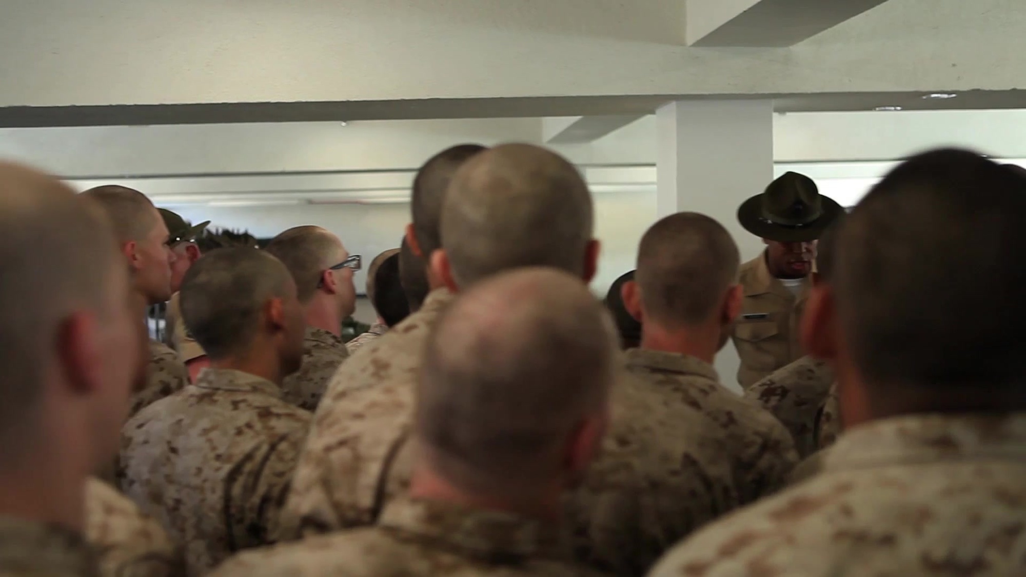 U.S. Marine Corps drill instructors with L Company, 3rd Recruit Training Battalion, Recruit Training Regiment, conduct gear inspections with recruits on pick-up day, aboard Marine Corps Recruit Depot, San Diego, Calif., March 18, 2016. The drill instructors were introduced to their recruits on pick-up day and immediately conducted gear inspections to ensure all recruits were prepared for training. (U.S. Marine Corps motion imagery by Sgt. John C. Lamb/RELEASED)