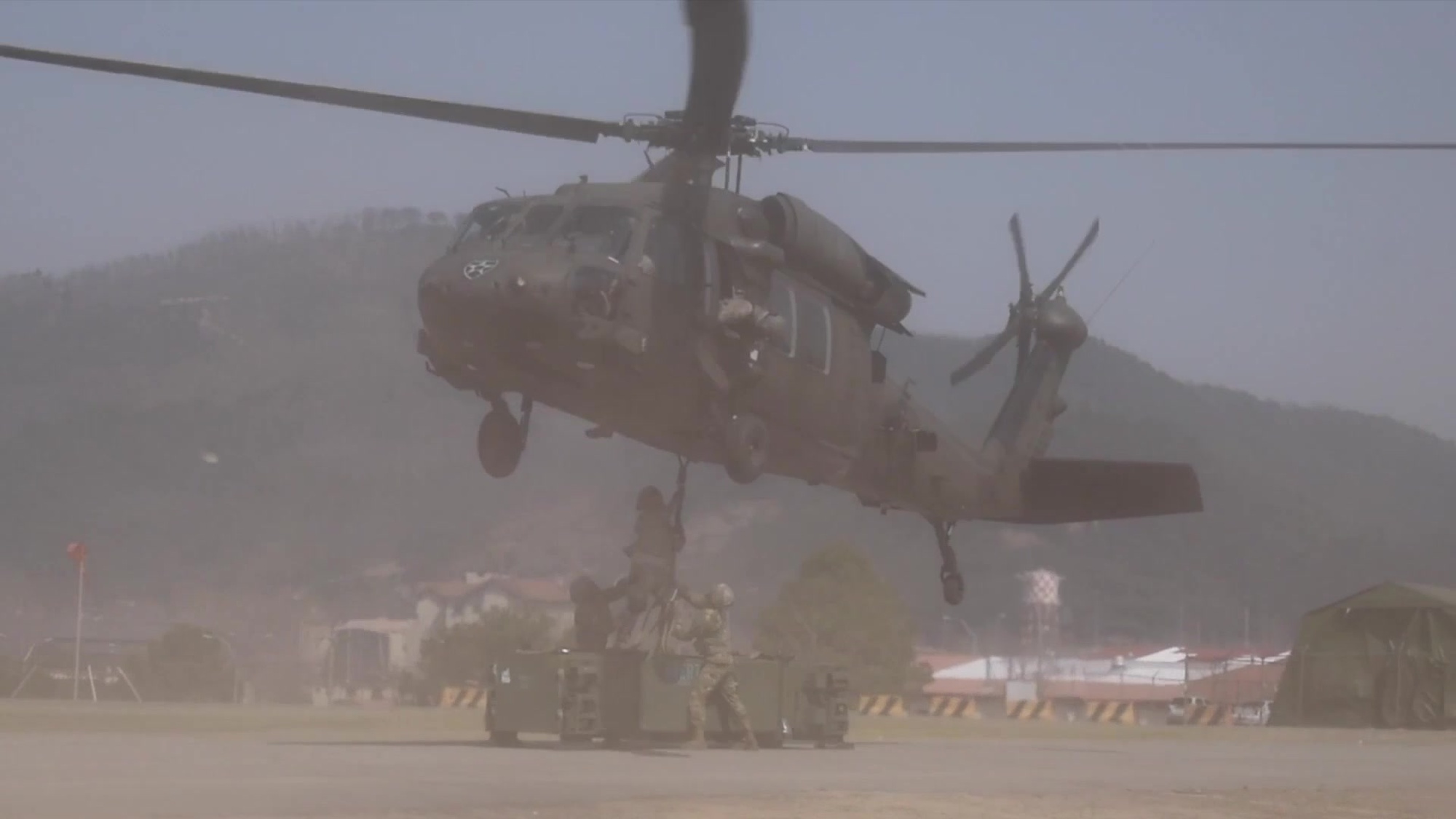 Soldiers from 2nd Battalion, 1st Air Defense Artillery Regiment conduct sling load training with Patriot Missile Round Trainers at Camp Carroll, South Korea with elements from 2nd Combat Aviation Brigade, March 30, 2016. (Video by Capt. William Leasure, 35th ADA Brigade Public Affairs)