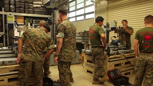 Explosive Ordnance Disposal Technicians Work With The Remote Fuse Disassembly System