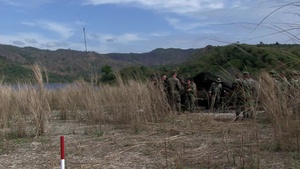 U.S. and Philippine Service Members Fire Artillery