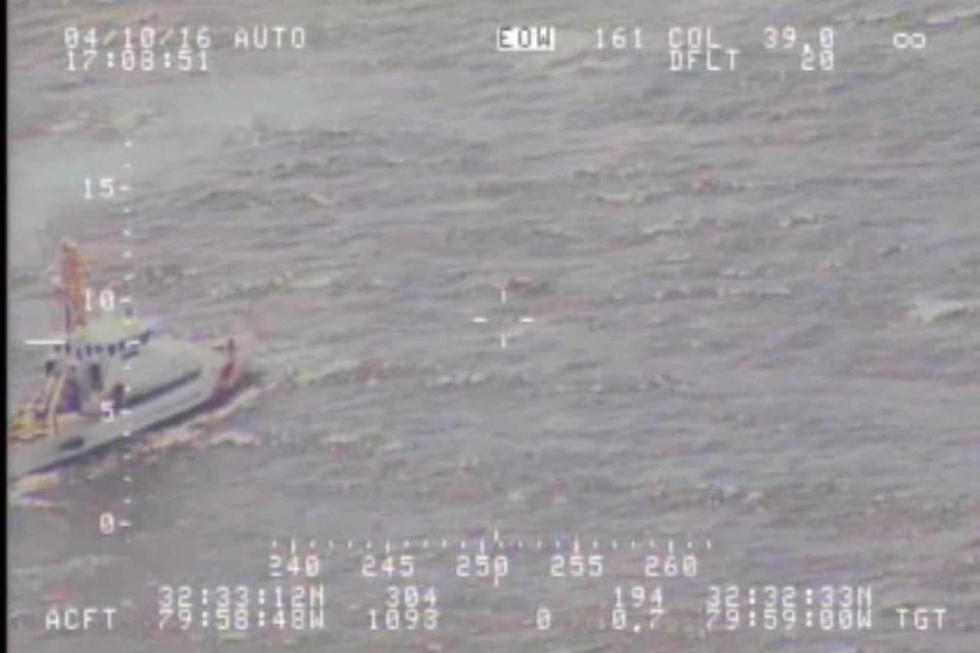 Members aboard the Coast Guard Cutter Yellowfin retrieve a kayak approximately four miles off the coast of Kiawah Island, South Carolina, during a search for two overdue kayakers, April 10, 2016. Local responders rescued one of the kayakers while crews continue the search for the second missing kayaker. U.S. Coast Guard video.
