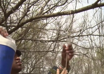 USAFSAM Students Hanging Mosquito Nets