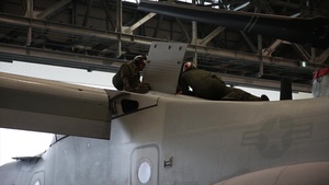 B-Roll of VMM-265 mechanics working on MV-22 Osprey aircraft