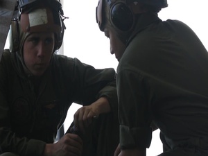 B-Roll of avionics mechanics with Marine Medium Tiltrotor Squadron 265 performing maintenance