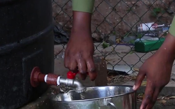 USCBP B-roll Tanzania Canine Handlers prepping Canine Detectors