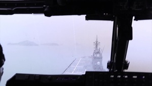 B-Roll of VMM-265 Marines and JMSDF loading supplies and flying to Japanese Ship Hyuga