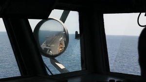 An AV-8B Harrier II takes off from the flight deck of amphibious assault ship USS Boxer (LHD 4)