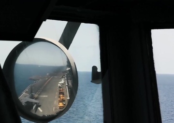An AV-8B Harrier II takes off from the flight deck of amphibious assault ship USS Boxer (LHD 4)