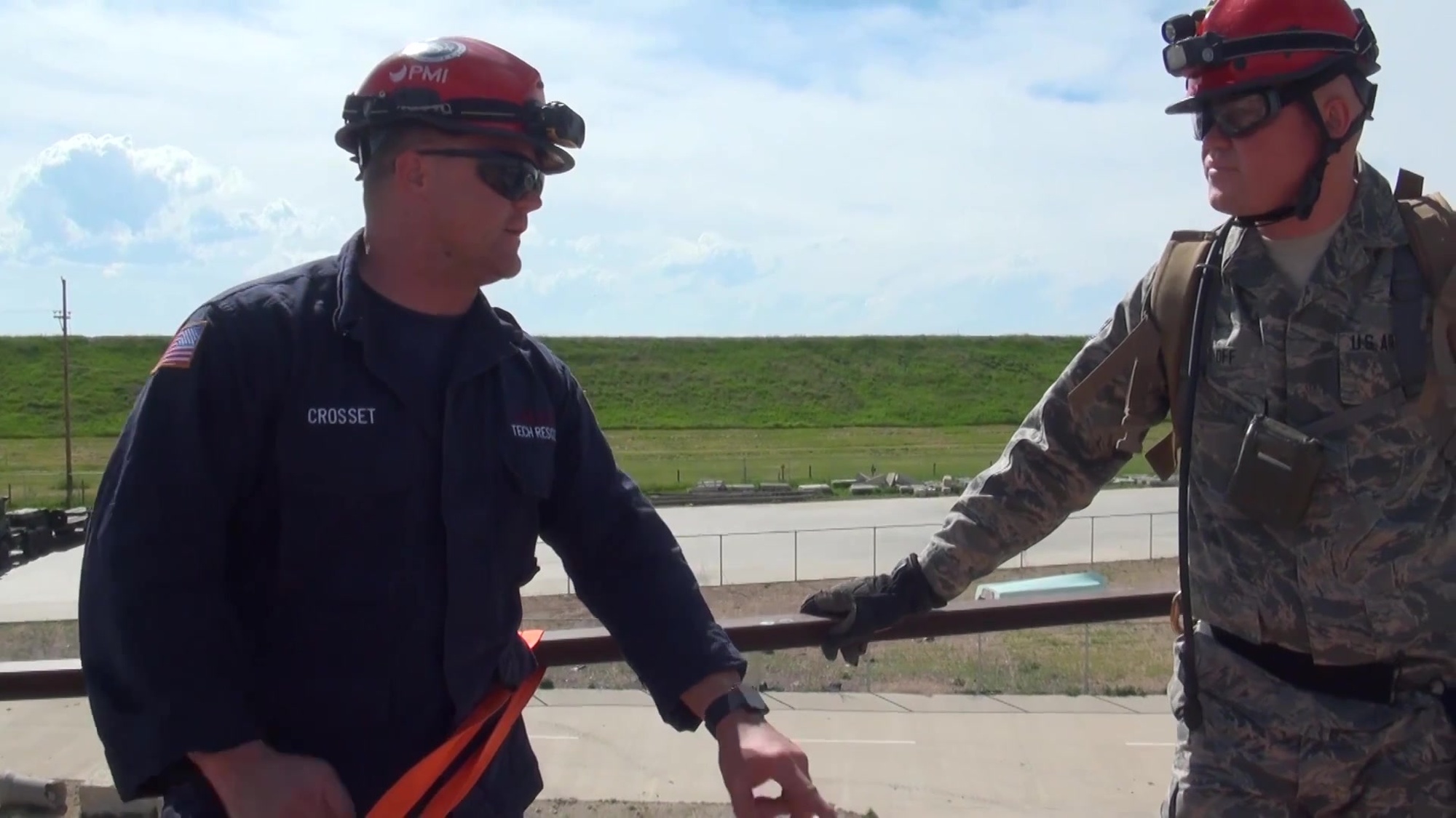 (Chemical, Biological, Radiological, Nuclear, Explosive) train for disaster response at the North Metro Fire Protection District Training Center.  Operation depicts the rescue of a life-size dummy with a broken leg from a 30 foot shipping container standing on it&#39;s end.  Work space is 8&#39; X 8&#39; with an angle iron safety rail around it.<br />SB1 Aaron Crossett, South Metro Fire Rescue, near Denver Colorado.<br />SB2 Sergeant Shelby Rosen, 3650th Maintenance Co, CERFP, Colorado Army National Guard<br />Also shown, SrA Casey Schoff, 140th Medical Group, Colorado Air National Guard Serge