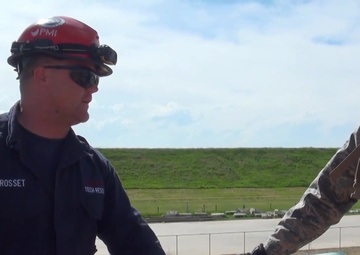 Rescue team lowers casualty from tower