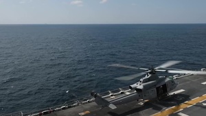 Two UH-1Y Venom Helicopters Assigned to Marine Medium Tilt Rotor Squadron (VMM) 166 Land on USS Boxer Flight Deck