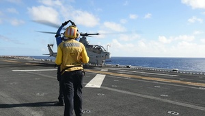Pilot Signaling Training of an AH-1Z Helicopter aboard USS Boxer (LHD4)