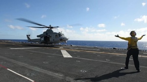 Pilot Signaling Training of an AH-1Z Helicopter aboard USS Boxer (LHD4)