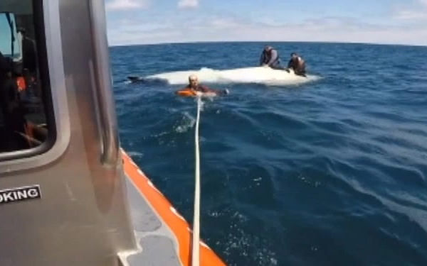 Wilmette Harbor rescues 3 from capsized vessel