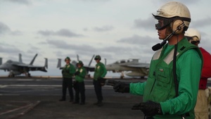 Sailors Perform Pre-Flight Checks on USS Dwight D. Eisenhower