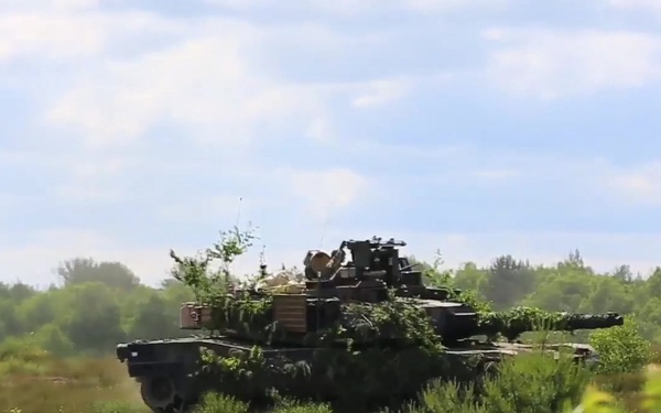 Manuevering M1A2 System Enhancement Package (SEP) v2 Abrams main battle tank during Operation Anakonda