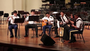 The Hawaii Army National Guard's 111th Army Band Collaborate And Perform With Hawaii Students