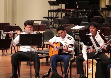 The Hawaii Army National Guard's 111th Army Band Collaborate And Perform With Hawaii Students