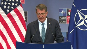 Carter Conducts News Conference at NATO headquarters