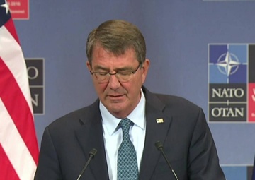 Carter Conducts News Conference at NATO headquarters