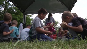 Troops Provide Chemical Defense Training to Polish Children (B-Roll)