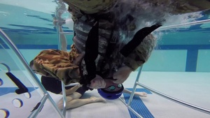 77th CAB aircrews train water survival at Fort Hood