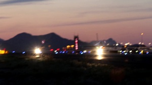 F-16s taxiing for night launch