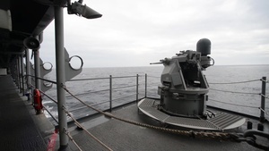 MK-38 25 MM machine gun system fires from amphibious assault ship USS Boxer (LHD 4) during an integrated live fire exercise