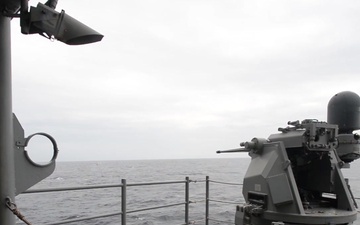 MK-38 25 MM machine gun system fires from amphibious assault ship USS Boxer (LHD 4) during an integrated live fire exercise