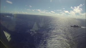 KC-135R makes low approach near USS John C. Stennis at RIMPAC