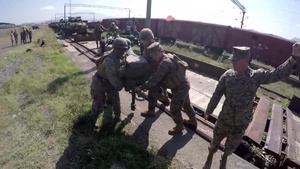 Marines, Georgians, unload equipment in preparation for Agile Spirit 16