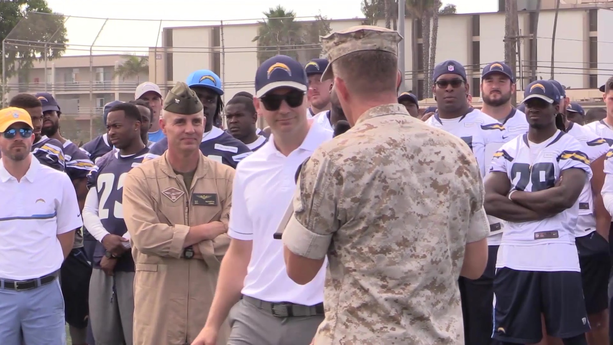 Members of the San Diego Chargers visit Marine Corps Air Station (MCAS) Miramar to show their support for military personnel at the Miramar Sports Complex aboard MCAS Miramar, August 31, 2016.  The team met with service members and their familyand signed autographs.  Col. Jason G. Woodworth, Commanding Officer, MCAS Miramar spoke at the event and presented the Chargers team with a plaque.  (U.S. Marine Corps Motion Imagery by Cpl. Alexander Pool/ Released)