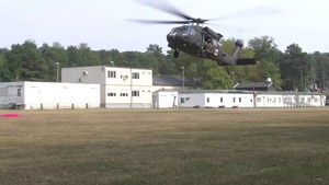 Army Reserve Medical Unit practices MEDEVAC with active duty Blackhawk