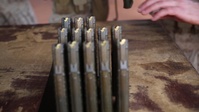 Marines and Aussie soldiers exchange weapons