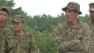 Marines with 3rd Battalion 3rd Marines celebrate the successful completion of Exercise Forest Light