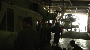 B-roll of Marines and Sailors offloading aircraft from U.S. vehicle carrier Green Cove