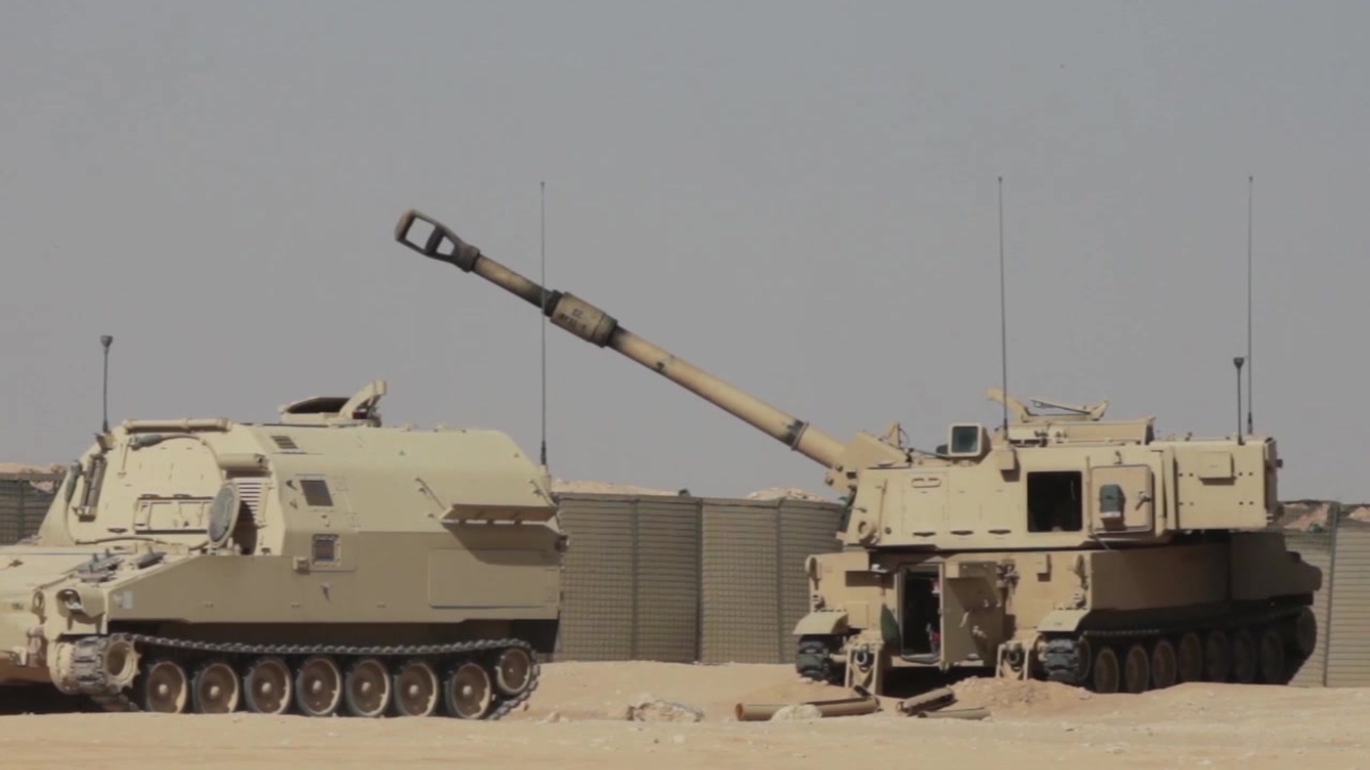 U.S Army Gen. Joseph L. Votel, commanding general, U.S. Central Command, prepares to fire an M-109 Paladin from Company A, 4-1 Field Artillery, 3rd ABCT, 1st Armored Division, at Al Asad Air Base, Iraq, Sept. 24, 2016. Field Artillery at Al Asad Air Base provides support to Iraqi forces during combat operations. Combined Joint Task Force – Operation Inherent Resolve is a multinational effort to train and support Iraqi security forces personnel to defeat Da’esh.