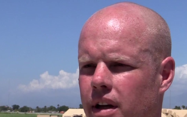 621st CRW Members Offload Bags of Rice in Port-au-Prince, Haiti