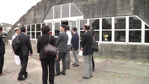 B-roll of JMSDF and Japan's Fuji Network System touring Marine Corps Air Station Iwakuni, Japan