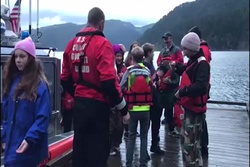 Coast Guard assists in rescue of 40 youths, 6 adults stranded at Camp David on Crescent Lake, Wash.
