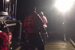 Coast Guard assists in rescue of 40 youths, 6 adults stranded at Camp David on Crescent Lake, Wash.