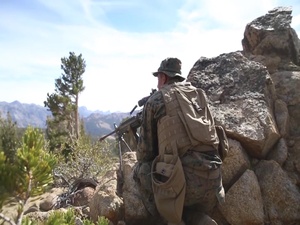 B-roll of Marines with 3rd Battalion 4th Marine Regiment movement to contact during Mountain Warfare Training